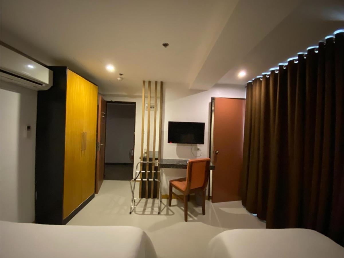 Capital O 820 Guijo Suites Makati Manila Eksteriør bilde