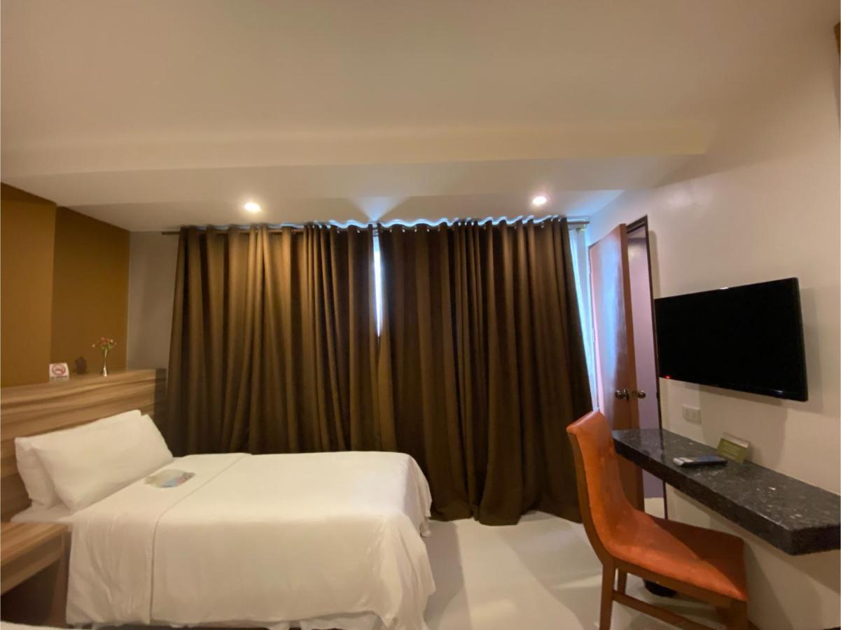Capital O 820 Guijo Suites Makati Manila Eksteriør bilde