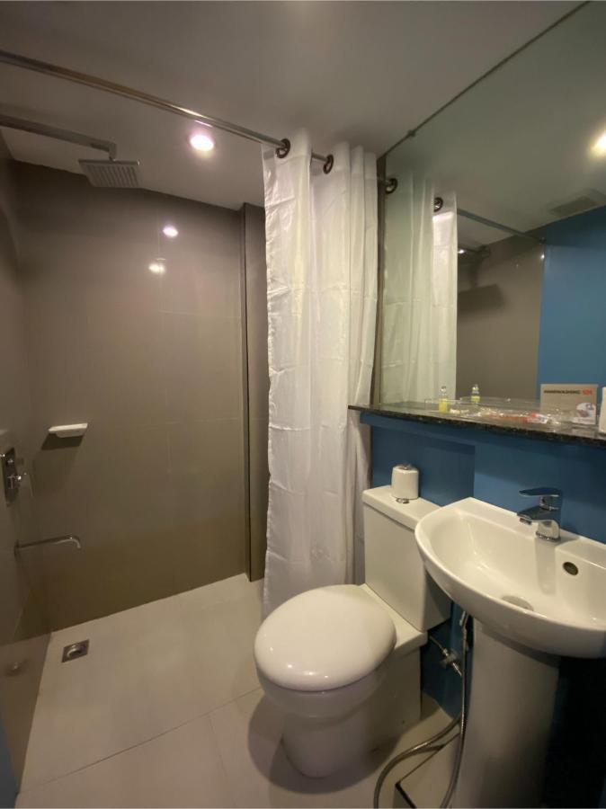 Capital O 820 Guijo Suites Makati Manila Eksteriør bilde